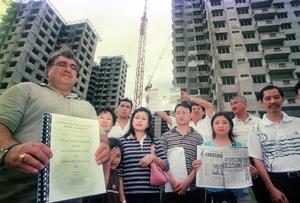 Help Us: Buyers for the low-cost housing project in Taman Setapak Jaya Baru claiming Kuala Lumpur City Hall (DBKL) and developer Pancaran Nilai Sdn Bhd had failed to complete the project since 1999 - Bernama picture